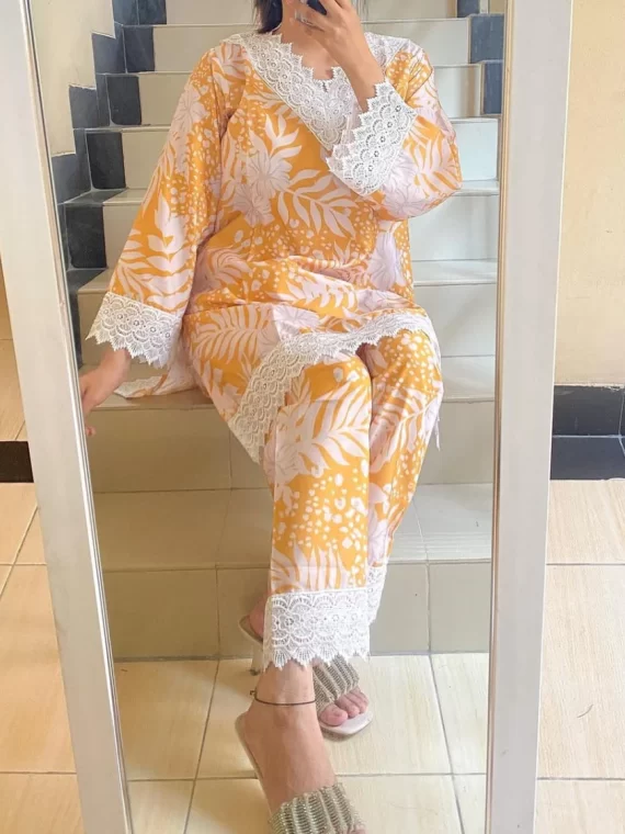 "Elegant Floral Lace Trimmed Yellow Kurta Set"